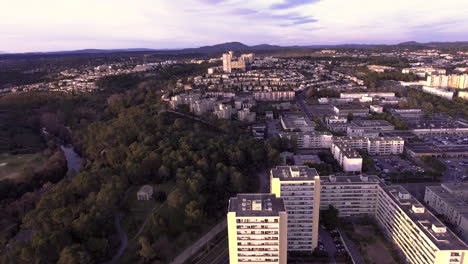 Aerial-back-tracking-over-residential-building-Hauts-de-Massane-neighborhood